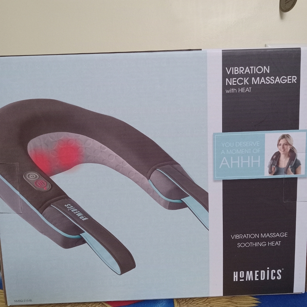 Heated neck massager